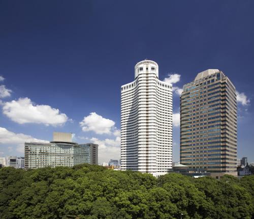 a group of tall buildings in a city at Hotel New Otani Tokyo Garden Tower in Tokyo