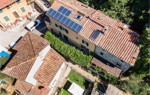 an overhead view of a house with solar panels on its roofs at 3 Bedroom Stunning Home In Marliana in Marliana