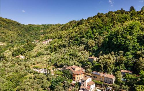 a small village on the side of a mountain at 3 Bedroom Stunning Home In Marliana in Marliana