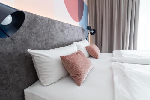 Mercure Mainz City Centerにあるベッド
