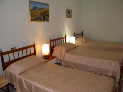 Кровать или кровати в номере La Casa di Prisco