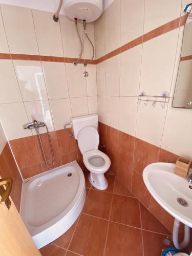a bathroom with a toilet and a sink at Apartments with parking space Metajna, Pag - 527 in Metajna