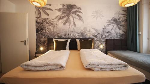 Ένα ή περισσότερα κρεβάτια σε δωμάτιο στο High-quality apartments near Residence - parking space