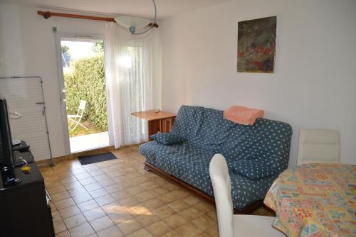 Photo de la galerie de l'établissement Appartement 2 pièces RDC jardin dans résidence avec piscine, à Arzon