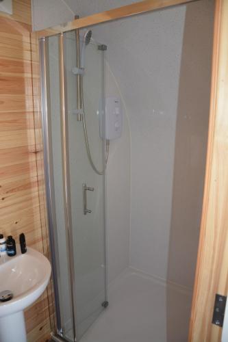 a bathroom with a shower and a sink at Arbor Hills in Gransha