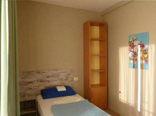 Postel nebo postele na pokoji v ubytování Ostello Torino