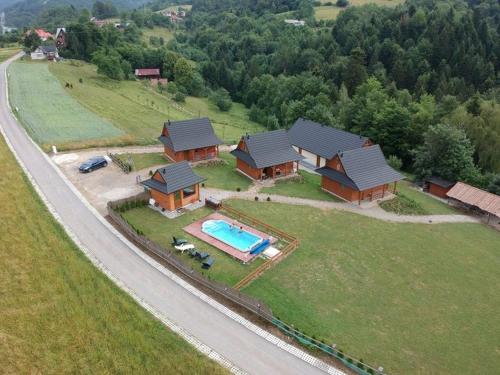 Bazén v ubytovaní Chatki Niwkii u Zbója Studio z antresolą alebo v jeho blízkosti
