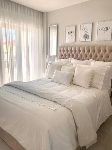 Postel nebo postele na pokoji v ubytování Ocean View Luxury Apartment