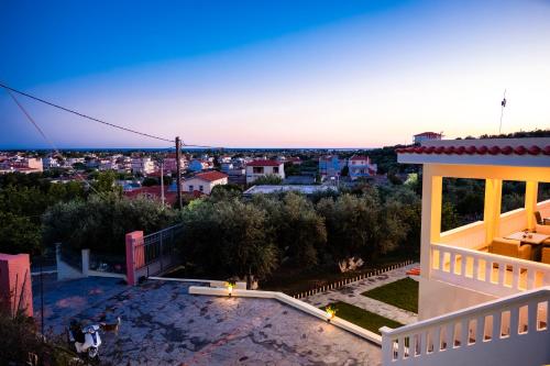 a view of a city from the balcony of a house at Τα ανετα διαμμερισματα του Λεκα in Zakharo