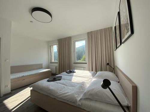 Postel nebo postele na pokoji v ubytování Apartmán LUEL