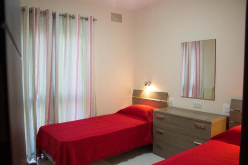Postel nebo postele na pokoji v ubytování Apartment Triq is-Silla