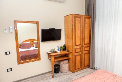 Ένα ή περισσότερα κρεβάτια σε δωμάτιο στο Utopia Hotel Baku