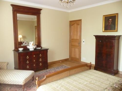 Cama o camas de una habitación en Chateau des Barrigards