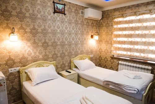 Postel nebo postele na pokoji v ubytování Durdona Guest House