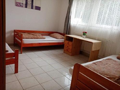 Letto o letti in una camera di Malomtavi Vendégház