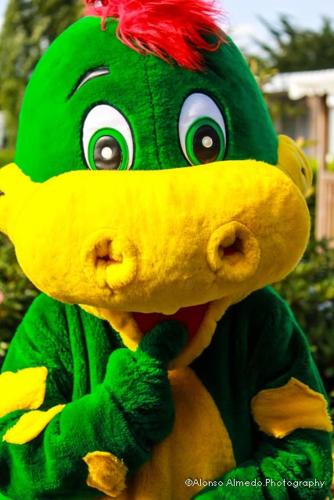 a green and yellow stuffed animal with a banana at Camping Le Beaulieu in Puilboreau
