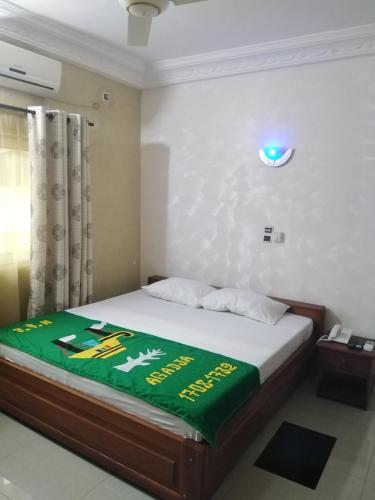 Postel nebo postele na pokoji v ubytování Bois vert Hôtel