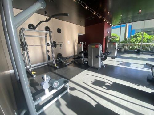 an empty gym with a fitness room with machines at Beachy Vibes Studio, 2 Full Beds, Near Everything -30B in Hallandale Beach