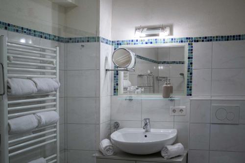 Un baño de Forellenhof Appartements & Grossmutters Bungalow