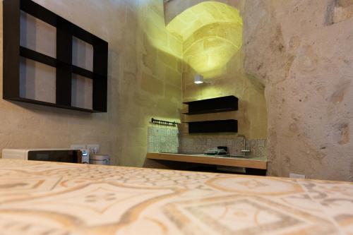Una cocina o zona de cocina en Grotta Barisano