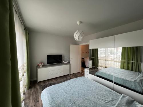 Ένα ή περισσότερα κρεβάτια σε δωμάτιο στο Apartament spatios, mobilat si utilat complet