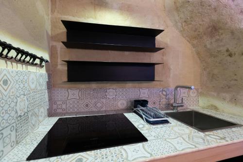 Una cocina o zona de cocina en Grotta Barisano