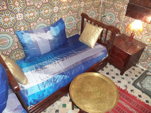 Una cama o camas en una habitación de Dar Nouzha A