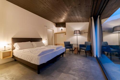 Ένα ή περισσότερα κρεβάτια σε δωμάτιο στο Agriturismo B&B Caffè e Vino