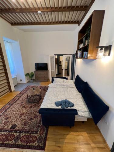 Posteľ alebo postele v izbe v ubytovaní Azure King Residence in the heart of Budapest