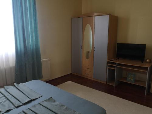 Rúm í herbergi á Apartman Stanimirović