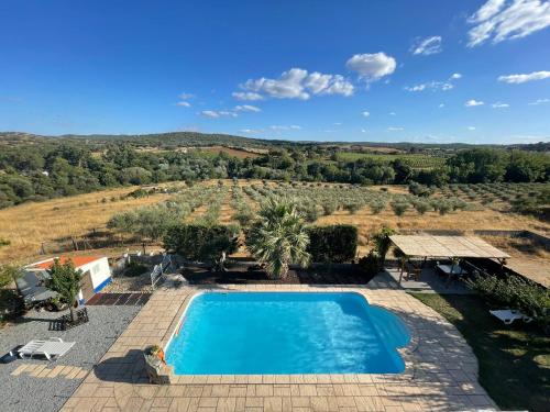 an image of a villa with a swimming pool at Monte de Stª Margarida in Montemor-o-Novo