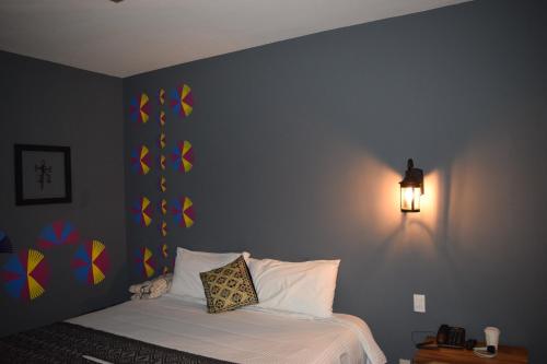 Una cama o camas en una habitación de Gran Barrio