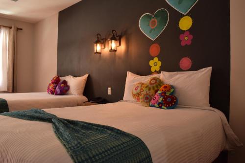 Una cama o camas en una habitación de Gran Barrio