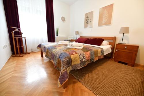 Ліжко або ліжка в номері Apartman Miran