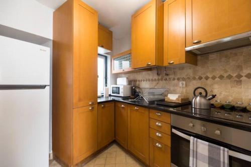 Virtuvė arba virtuvėlė apgyvendinimo įstaigoje Ola Lisbon - Alfama II