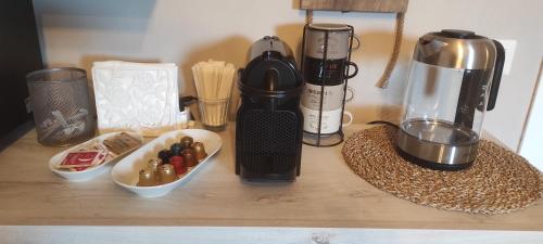 a counter with a coffee maker and a blender at Il Sogno in Spello