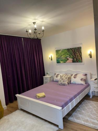 Ένα ή περισσότερα κρεβάτια σε δωμάτιο στο Apartament Gabriela 39