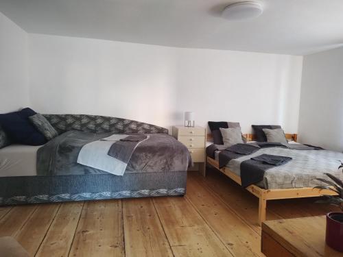 Posteľ alebo postele v izbe v ubytovaní Apartman BALA