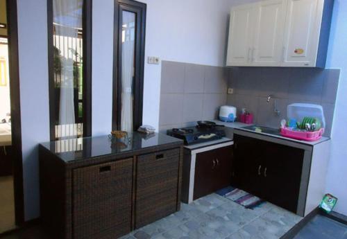 Kuchyň nebo kuchyňský kout v ubytování villa DND