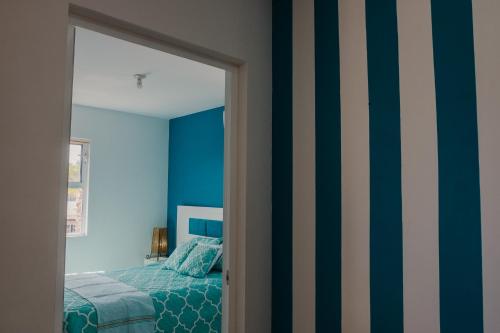 Una cama o camas en una habitación de Punta Esmeralda I
