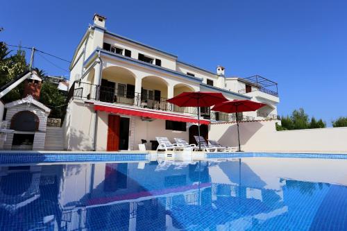 Fotografia z galérie ubytovania Seaside family friendly house with a swimming pool Seget Vranjica, Trogir - 10336 v Seget Vranjici