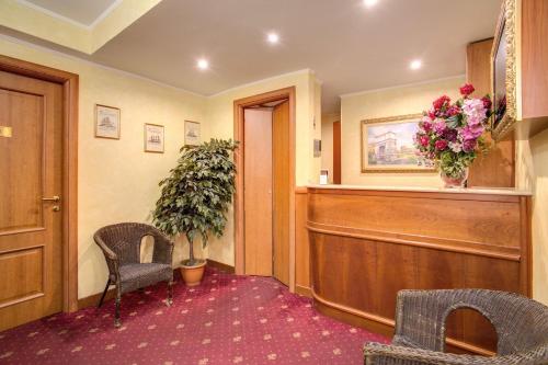 Coin salon dans l'établissement Monti Guest House - Affittacamere