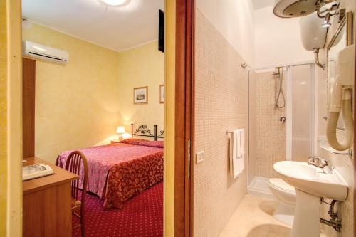 Ванна кімната в Monti Guest House - Affittacamere