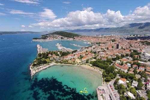 an aerial view of a city and a body of water at Apartments with a parking space Split - 11726 in Split