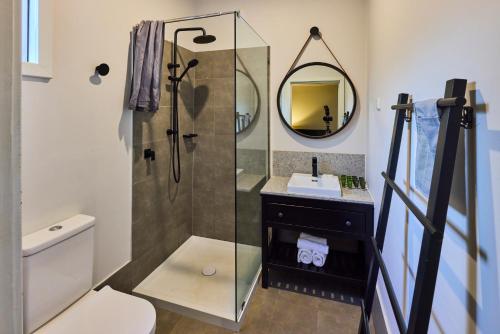 a bathroom with a glass shower and a sink at RAC Margaret River Nature Park in Margaret River Town