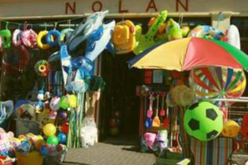 a toy store with a soccer ball and an umbrella at Luxurious Property, Paddy's Haven, Wild Atlantic Way, County Clare in Kilrush