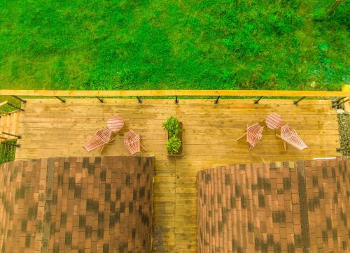 a wooden fence with bows on top of it at Kazbegi Glamping in Stepantsminda