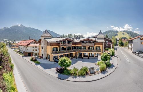 an aerial view of a town with mountains in the background at Apartment Torri di Seefeld in Seefeld in Tirol