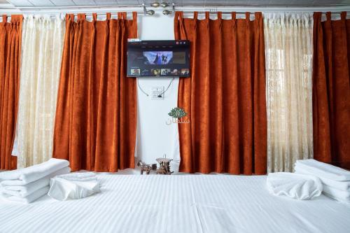 Postel nebo postele na pokoji v ubytování Hotel Sultan Residency