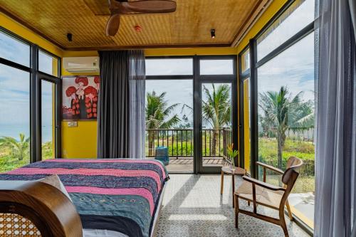 Postel nebo postele na pokoji v ubytování May Villa 6BR Beachfront An Bang Beach Hoi An by Beachside Boutique Homes